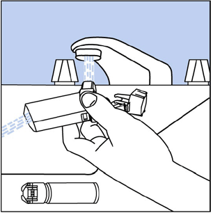 Hold the plastic actuator under the faucet
and run warm water through it for about 30 seconds - Illustration