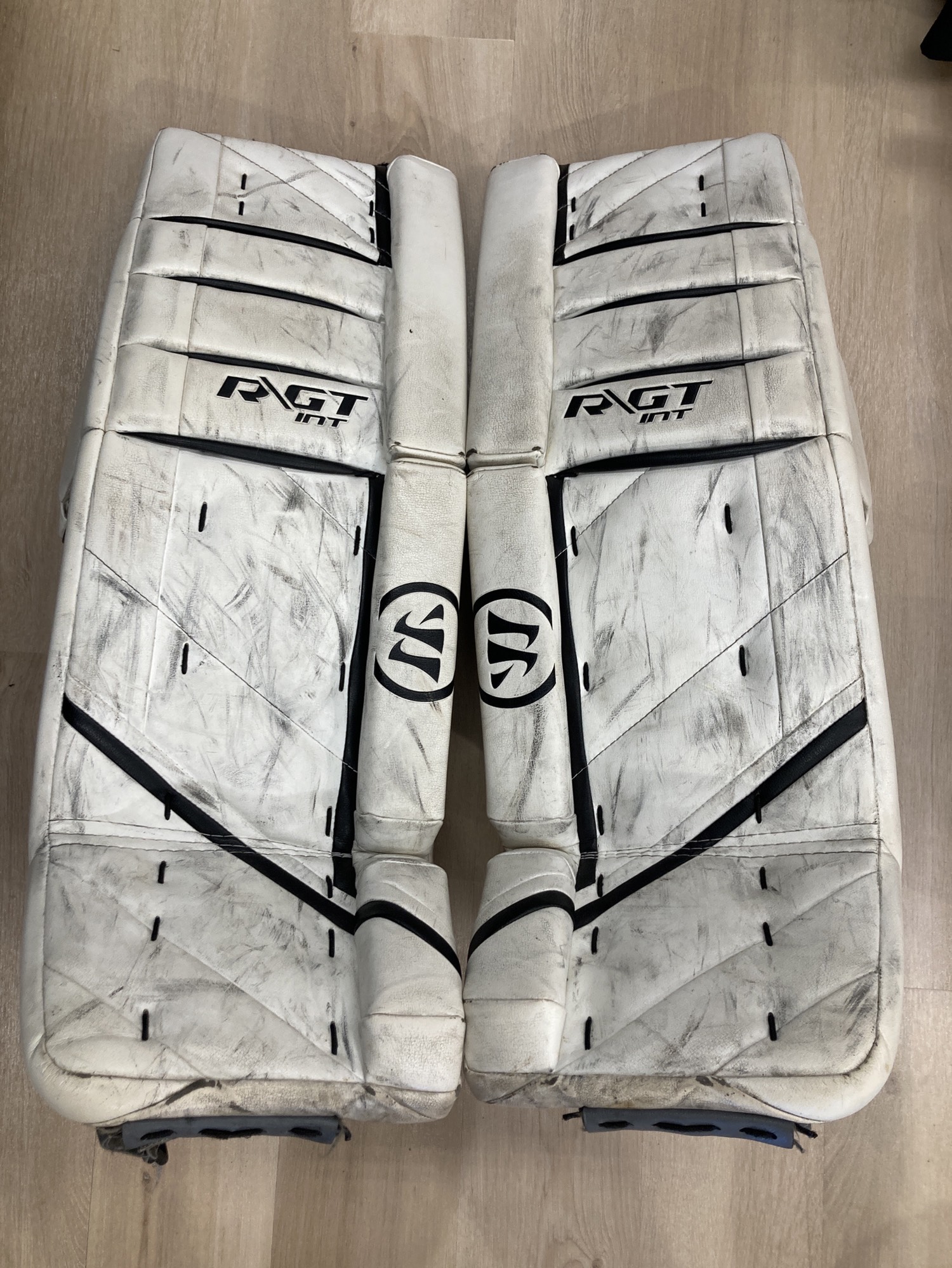 White Used 31" Intermediate Warrior Ritual GT Goalie Leg Pads