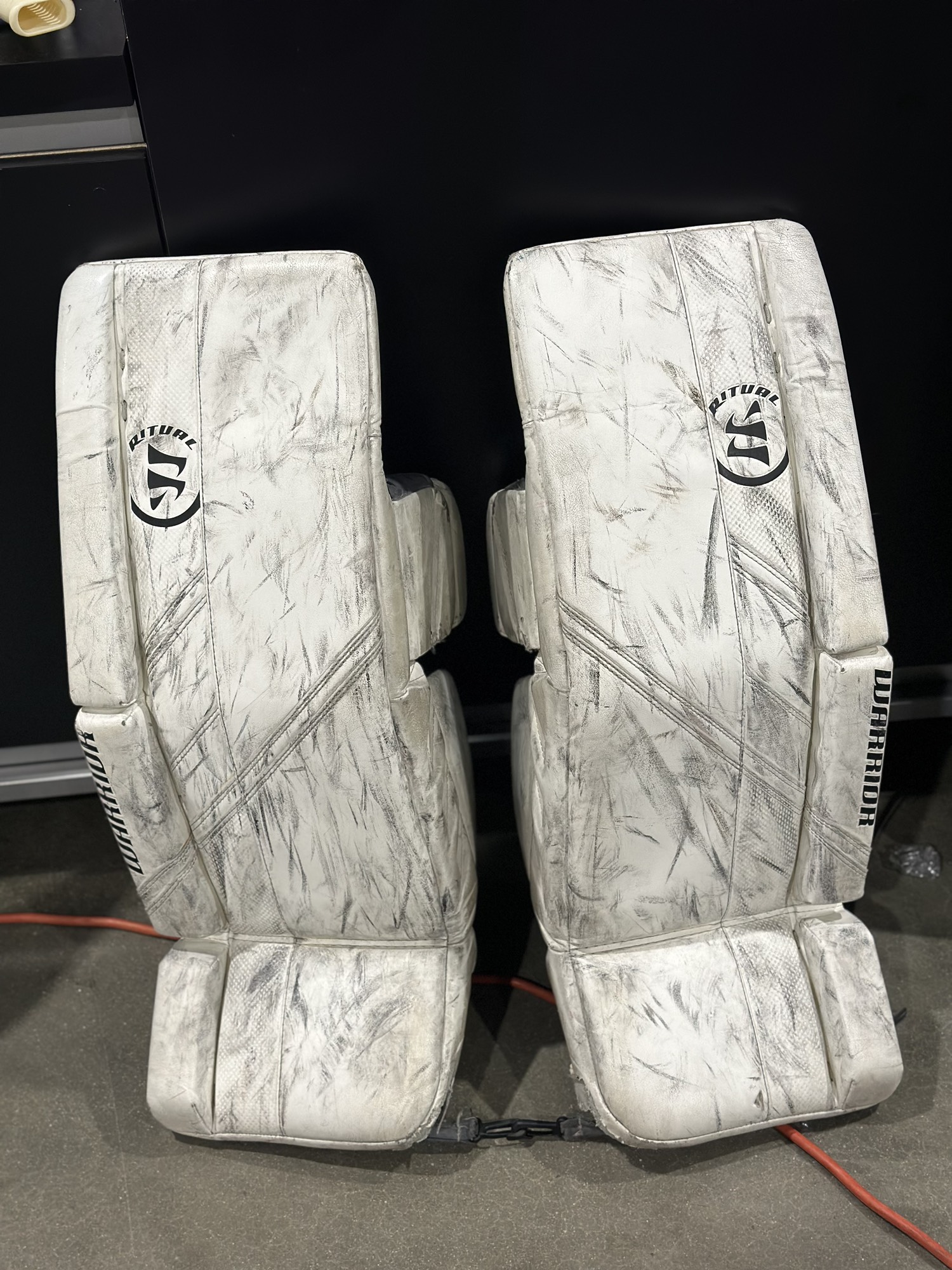 White Used 31" Intermediate Warrior Ritual G5 Goalie Leg Pads