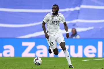 Antonio Rudiger of Real Madrid CF runs with the ball