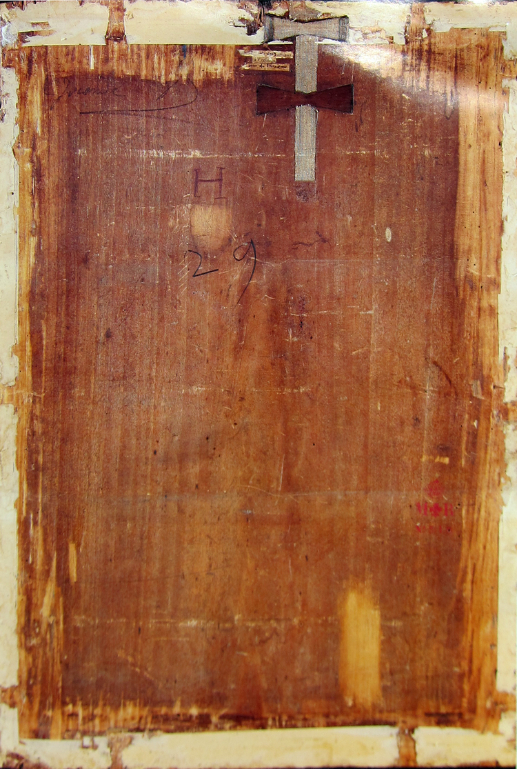   The back panel of the Mona Lisa. Notice the butterfly brace that is keeping a crack from spreading.&nbsp;  