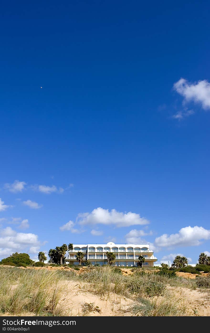 Luxury white Spanish hotel on the beach