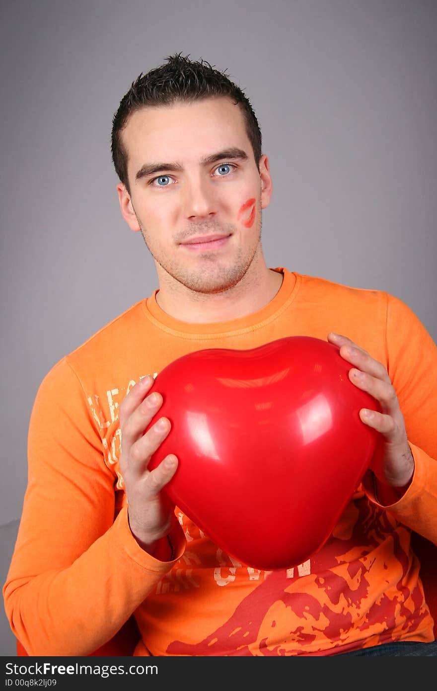 Funny guy with red balloon