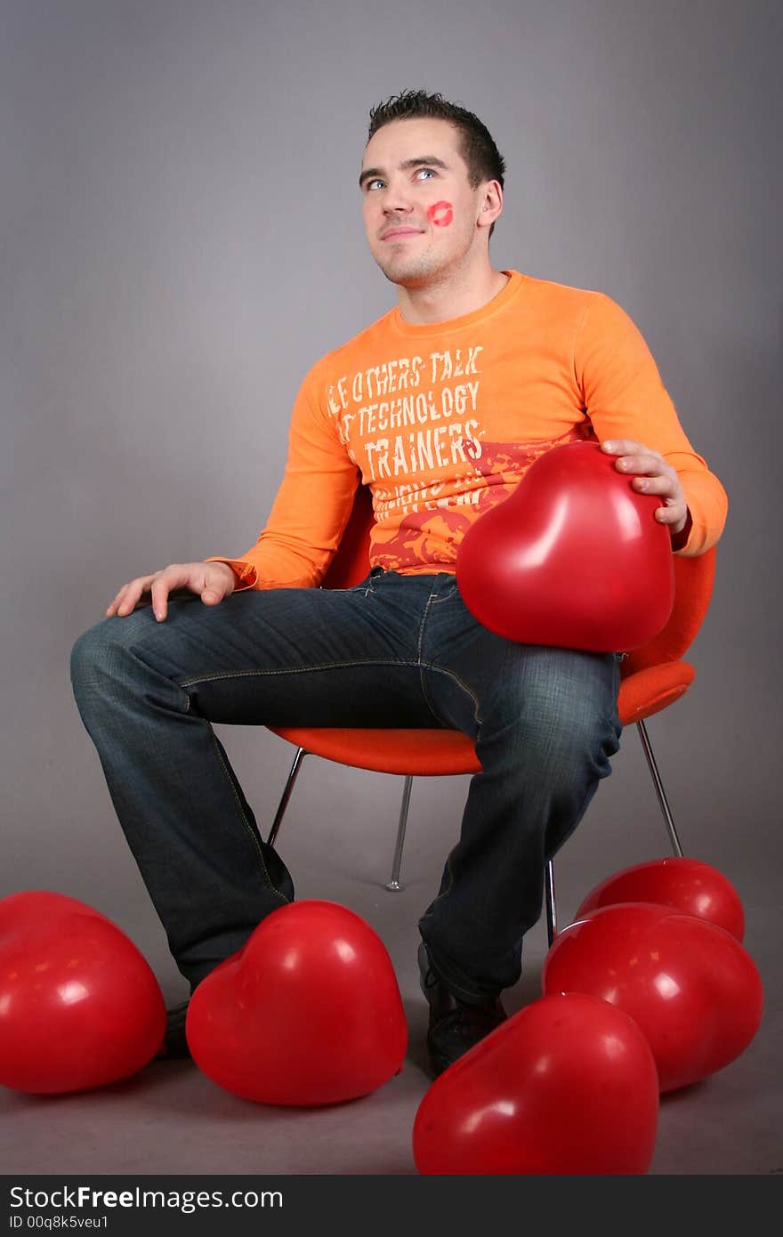 Funny guy with red balloons