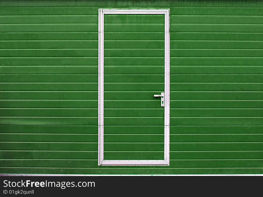 Simple metal door in colored wall (different colors are available). Simple metal door in colored wall (different colors are available)