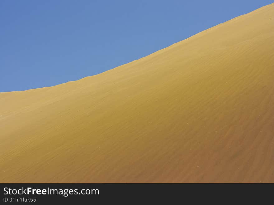 A photo of the warm texture of a desert. A photo of the warm texture of a desert.