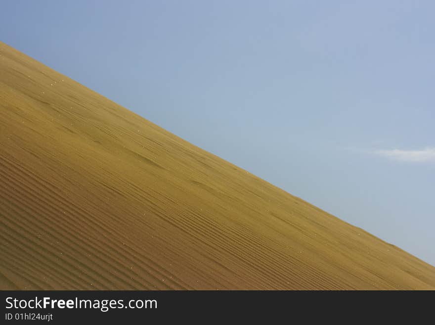 A photo of the warm texture of a desert. A photo of the warm texture of a desert.