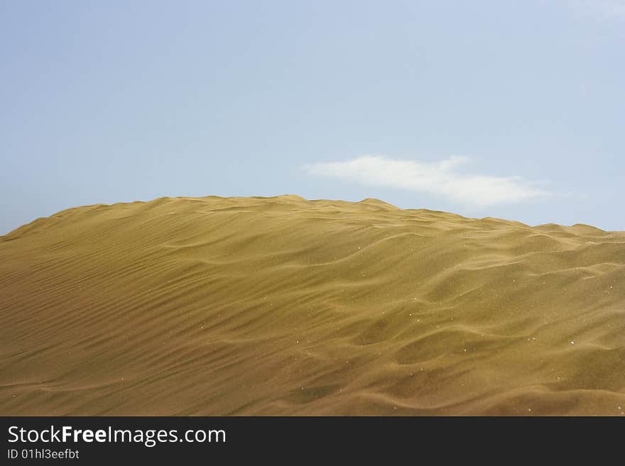 A photo of the warm texture of a desert. A photo of the warm texture of a desert.