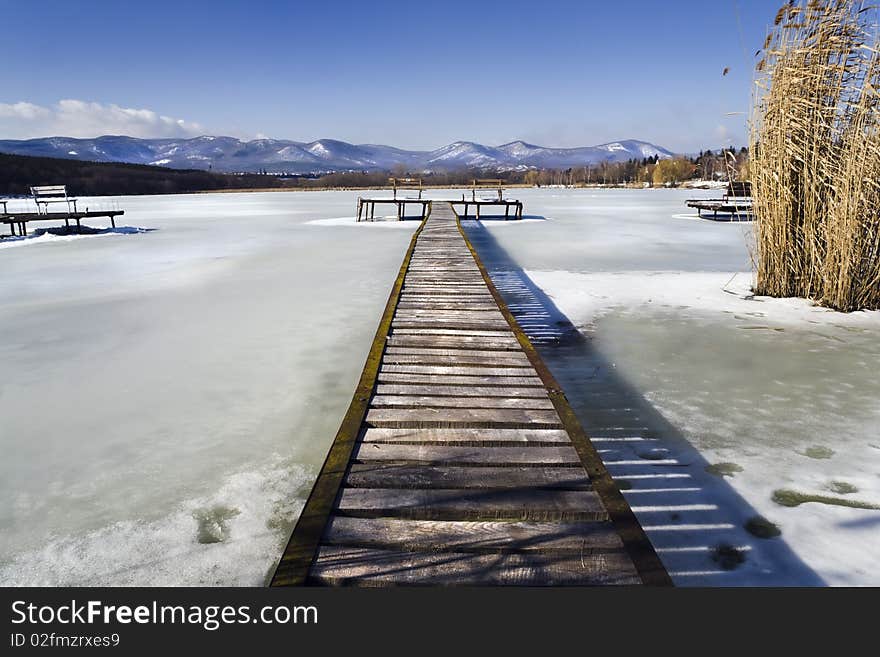 Pier wintertime on the lake, high density range image. Pier wintertime on the lake, high density range image