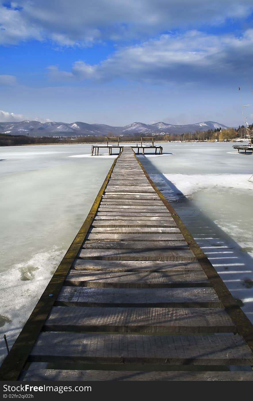 Pier wintertime on the lake, high density range image. Pier wintertime on the lake, high density range image