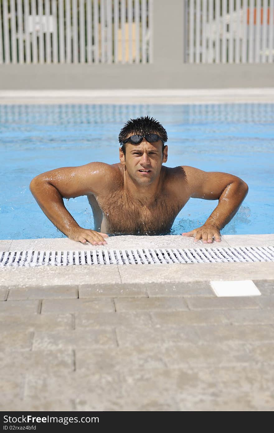 Young athlete at swimming pool