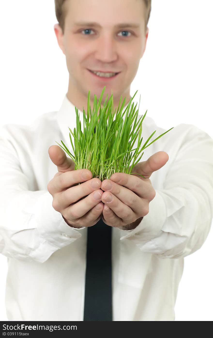 Man holding a small plant in the studio isolated