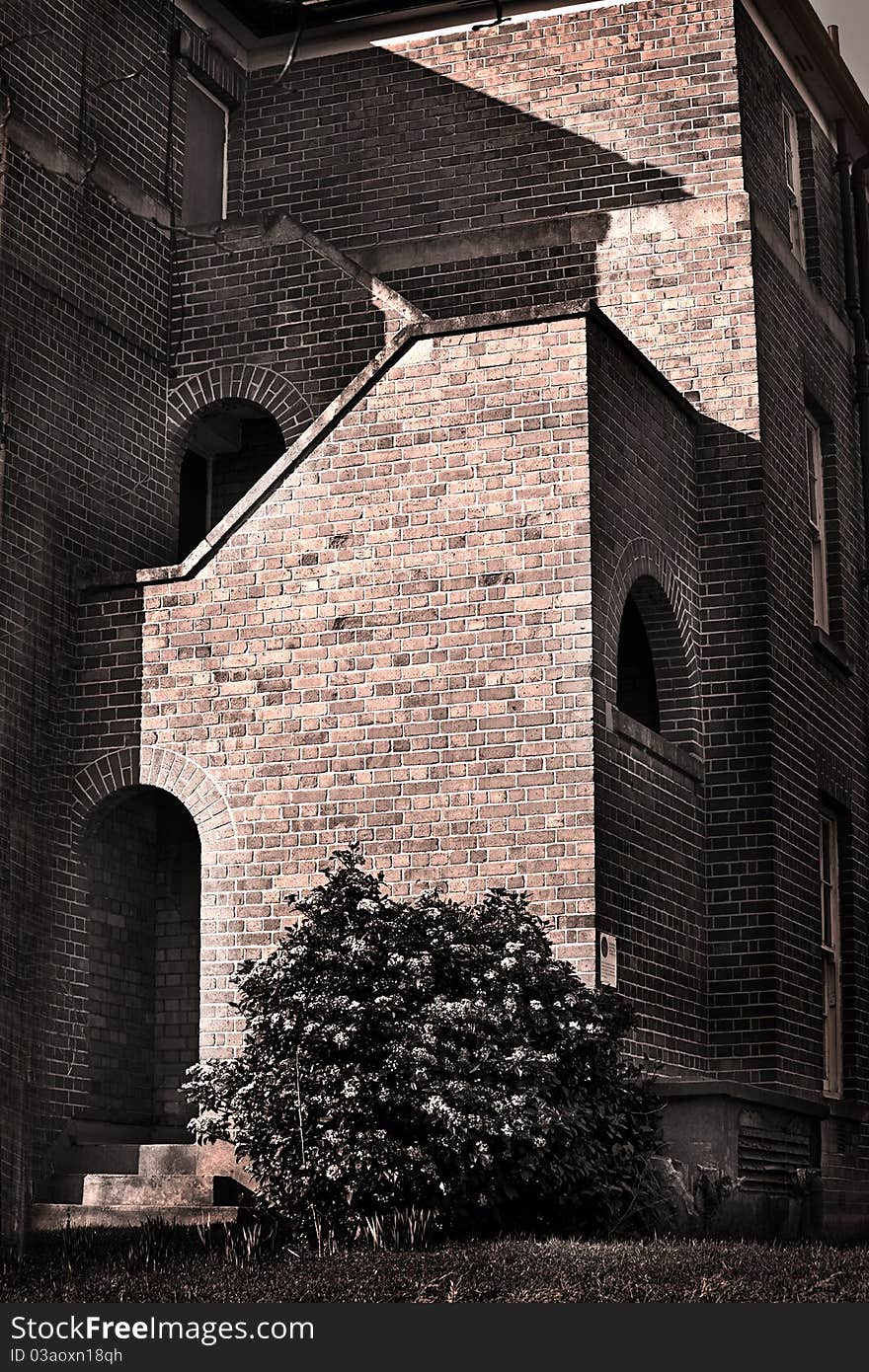 Old vintage brick building in sepia tone