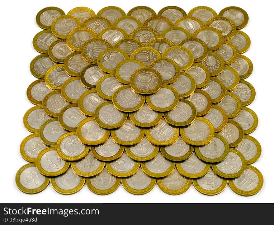 Pyramid made of coins on a white background