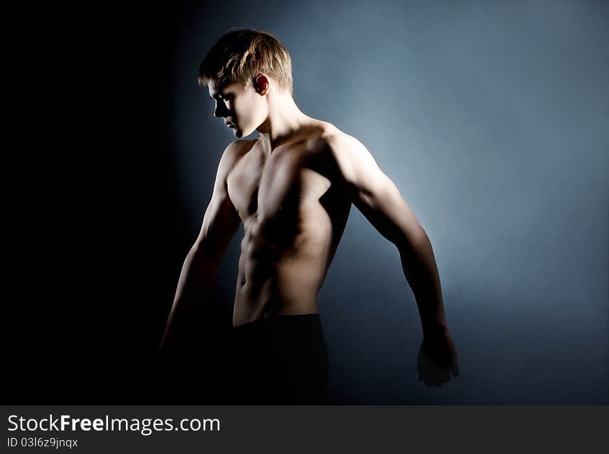 Photo of naked athlete with strong body