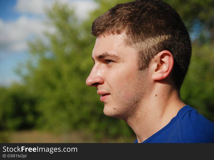 Portrait of the young smiling sportsman. Portrait of the young smiling sportsman