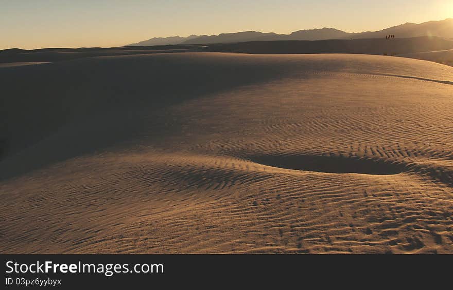 Desert, waves, golden sand and sky. Desert, waves, golden sand and sky.