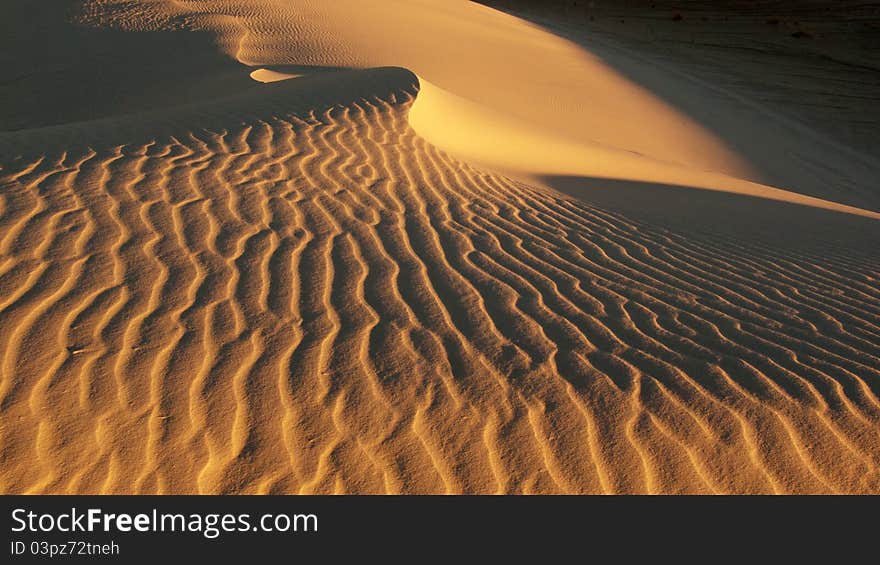 Desert, waves, golden sand and sky.white sand. Desert, waves, golden sand and sky.white sand.