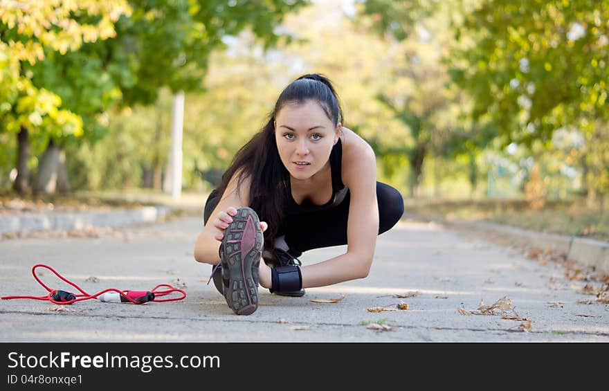 Woman athlete warming up