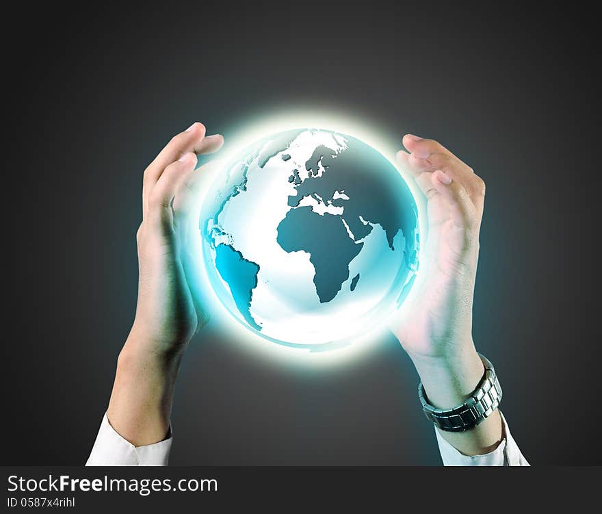 Business man holding a earth globe in his hands in grey background