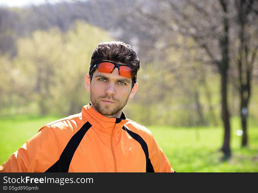 Portrait of Young Attractive Sportsman Outdoor. Portrait of Young Attractive Sportsman Outdoor