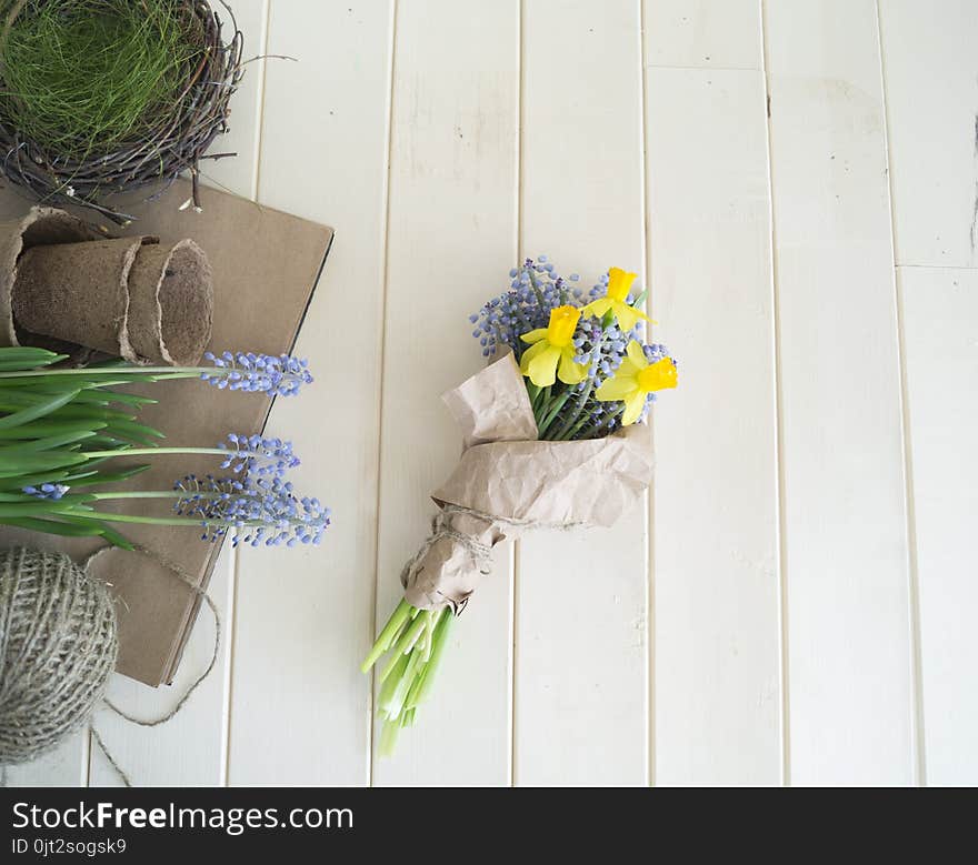 Children`s hands collect a bouquet as a gift. A gift for mom.