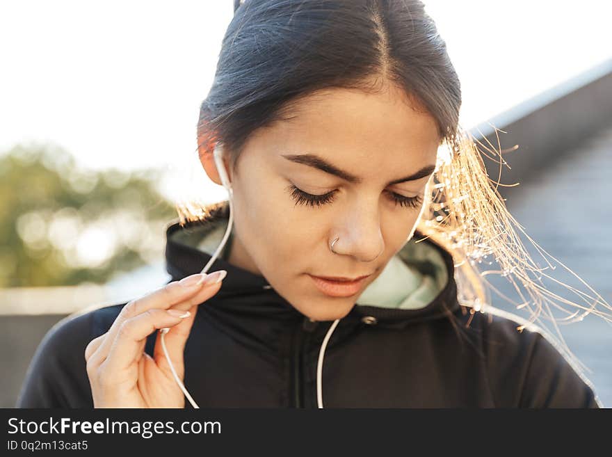 Close up of an attractive young fitness woman