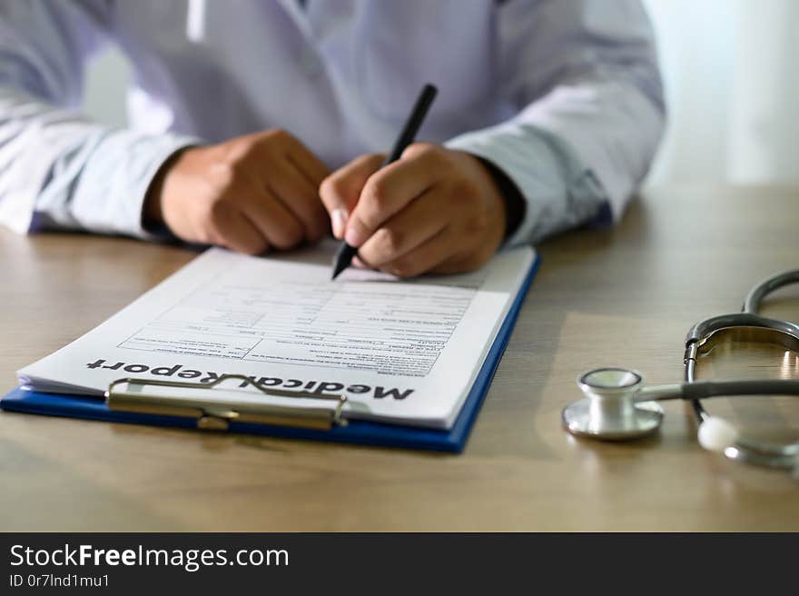 Doctor using computer medical record  medical report or medical certificate database of patient`s health care c c