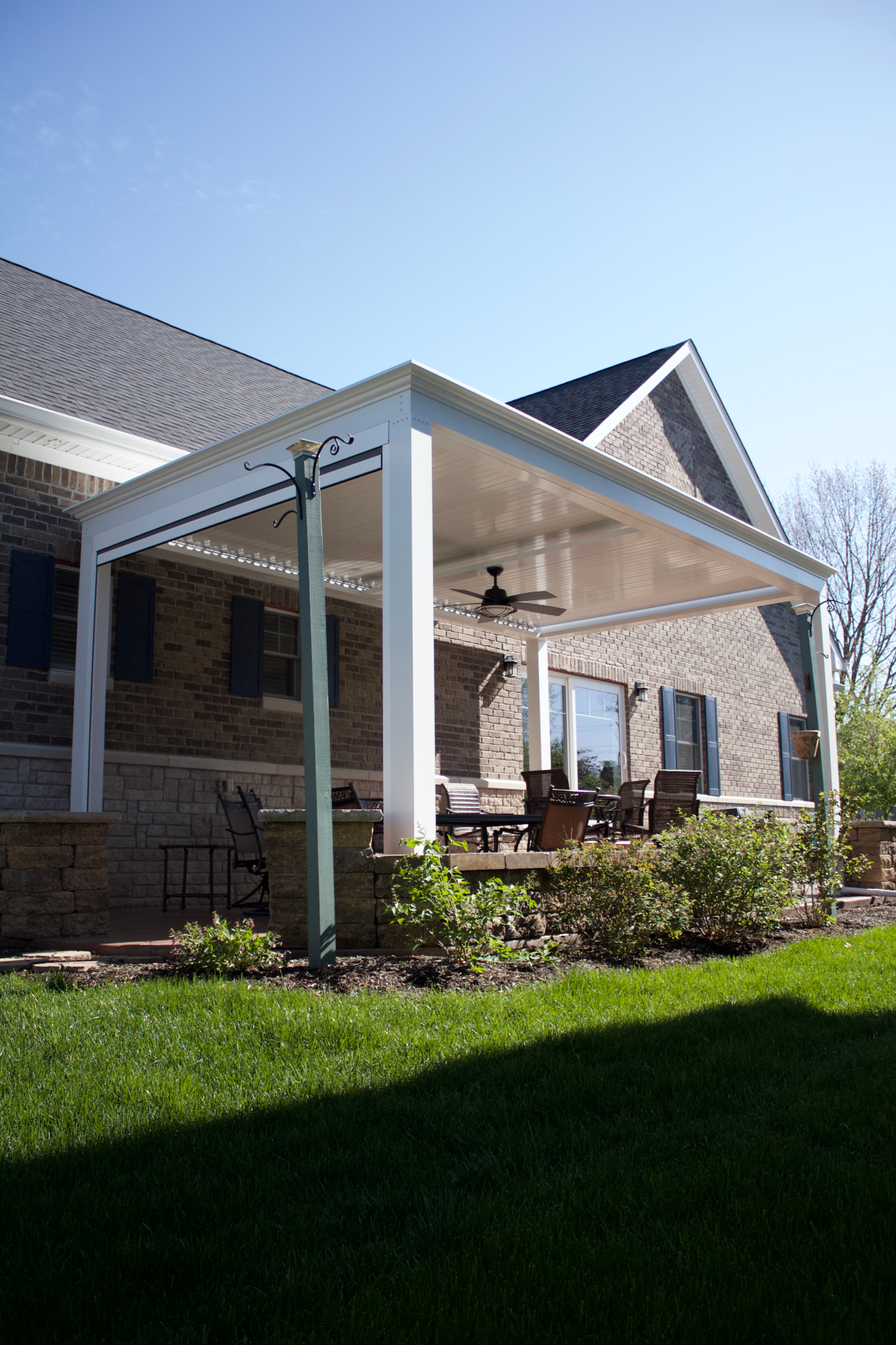 White Pergolas Add On A Center Beam For A Fan