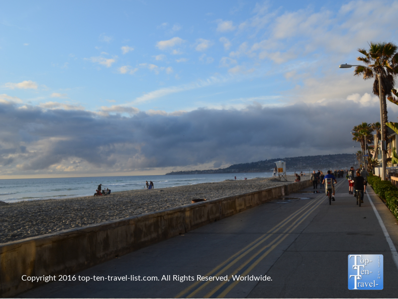 Biking along the Mission Beach boardwalk in San Diego CA