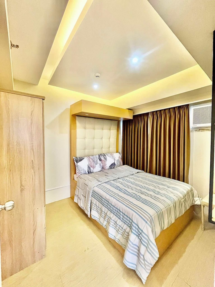 Cozy 2-bedroom condo in charming Davao City with WiFi, AC - Davao | Vrbo