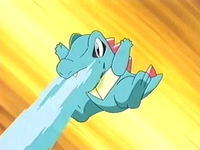 Totodile usando pistola agua.