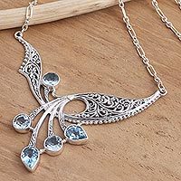 Blue topaz pendant necklace, Winged Dreams