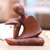 Wood statuette, 'Unwind' - Suar Wood Statuette