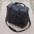 Expandable leather wheeled travel bag, 'Style Voyager' - Black and Navy Expandable Leather Travel Bag with Wheels