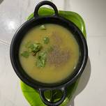 A picture of Potato and spring onion soup.