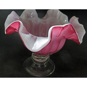 A vintage pink glass footed bowl dating to around 1980. Excellent condition.