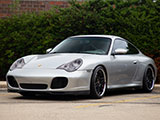 Silver Porsche 911 4S on black wheels