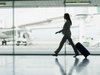 Businesswoman walking through an airport