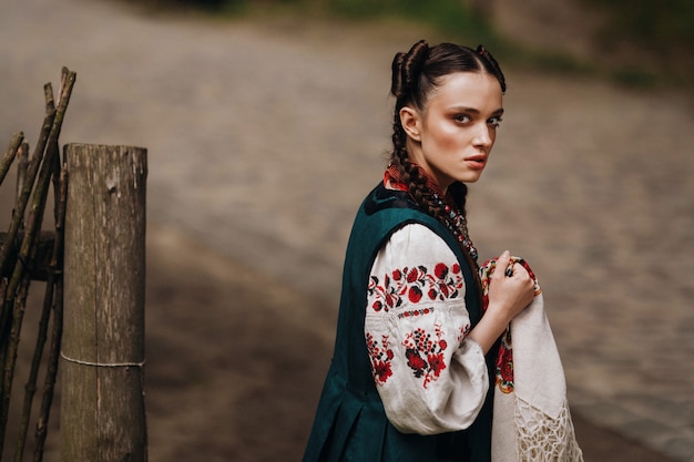 Free Photo | Сharming girl in the ukrainian traditional dress is walking