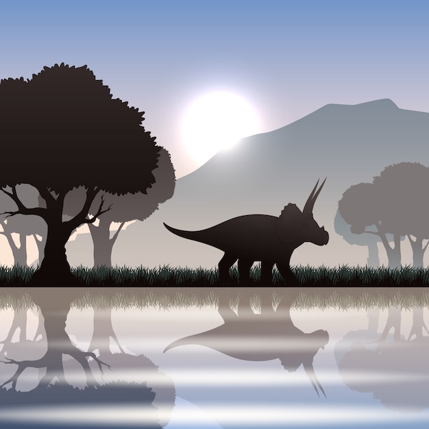 Triceratops dinosaur silhouette in scenic landscape with lake\
mountain and giant trees