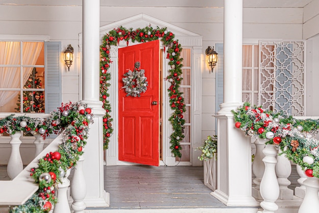 Premium Photo | Christmas porch decoration idea. house entrance ...