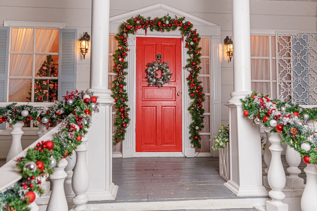 Premium Photo | Christmas porch decoration idea. house entrance ...