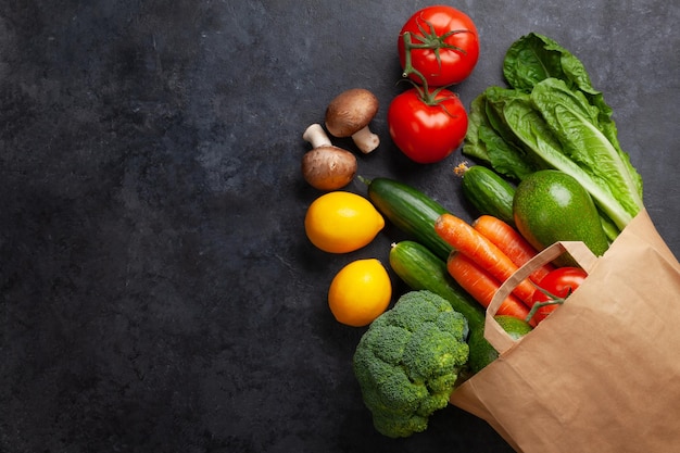 Premium Photo | Different food in recycling paper bag