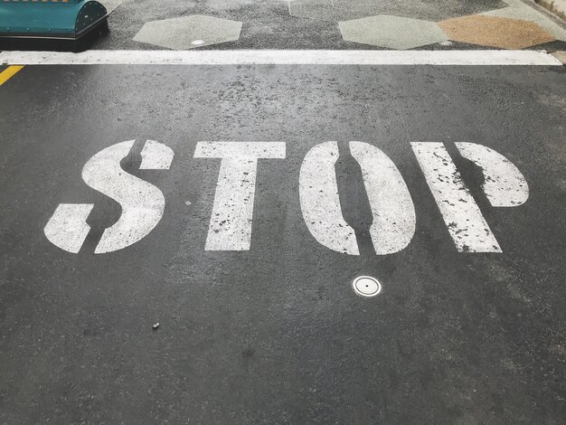 Premium Photo | High angle view of stop sign on road