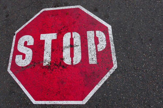 Premium Photo | High angle view of stop sign on road