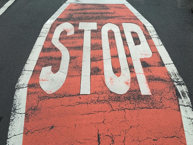 Premium Photo | High angle view of stop sign on road