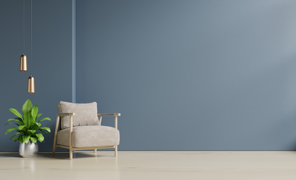 Premium Photo | The interior has a armchair on empty dark blue wall ... image.