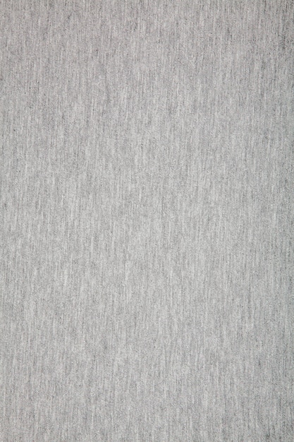 Real heather grey knitted fabric made of synthetic fibres\
textured background