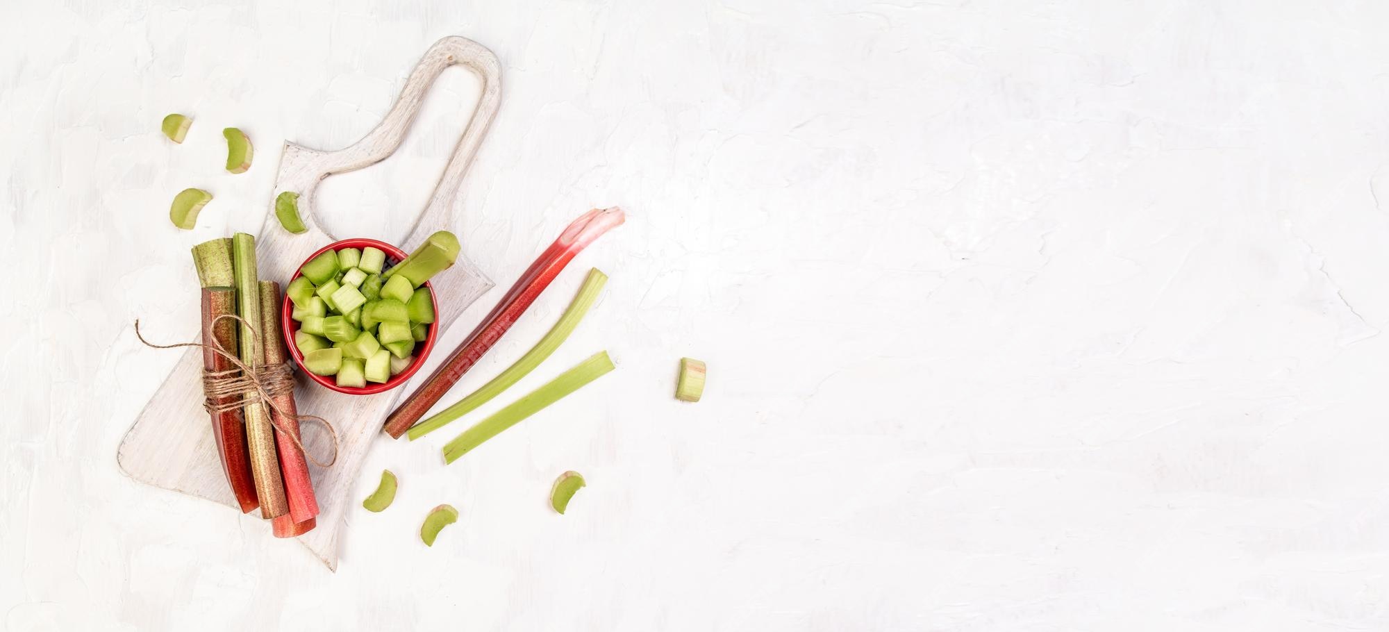 Premium Photo | Rhubarb stalks on a board white background banner catering  menu recipe place for text top view